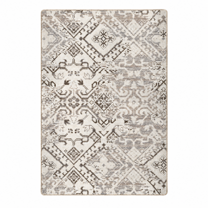 Afterimage area rug: a rectangular area rug with a distressed, vintage-style geometric and tribal pattern in shades of gray, taupe, and off-white on a white background.