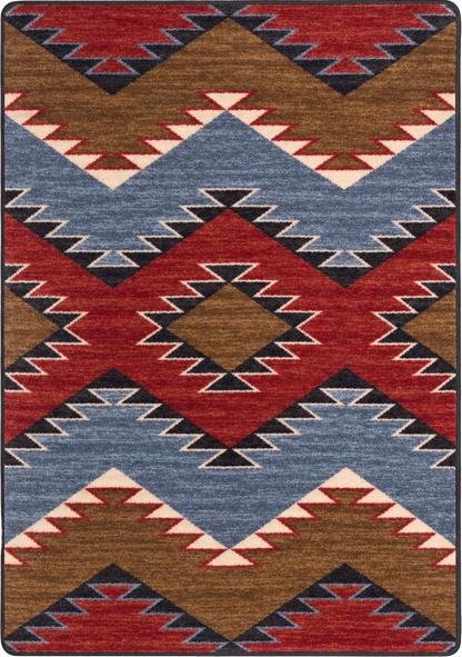 A square area rug with a Southwestern geometric pattern featuring red, blue, brown, black, and cream zigzags and diamonds.