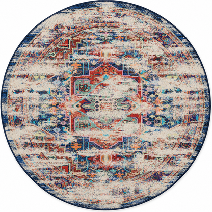 Navy blue round area rug called Daydream wth distressing that looks like clouds both worn and bright.