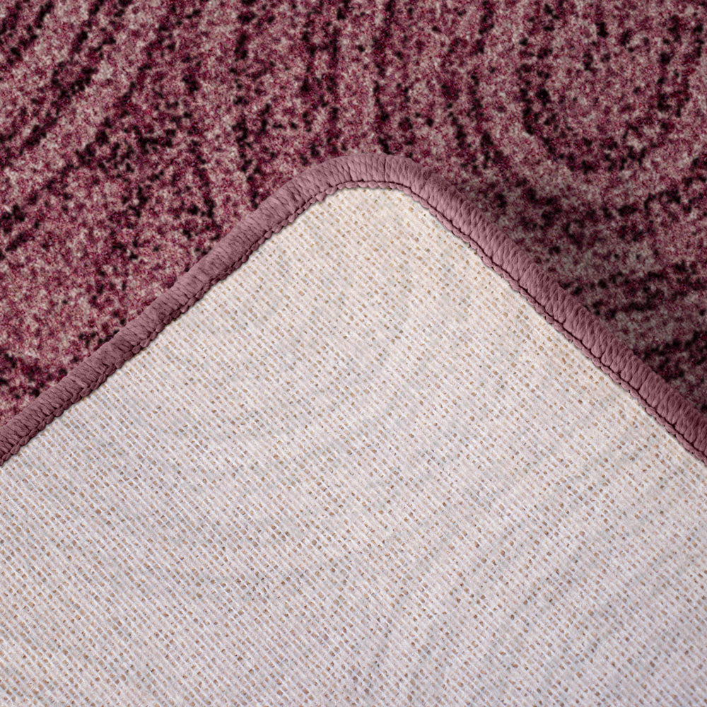 Detour area rug with corner turned back to show backing
