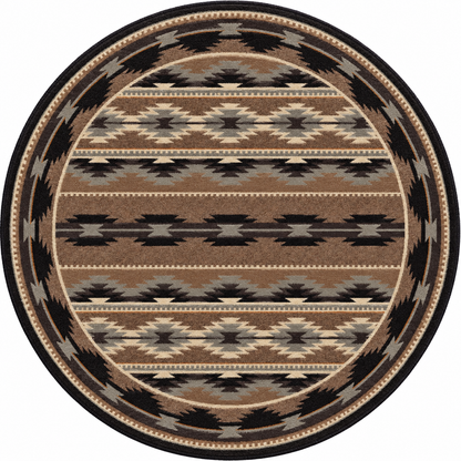 A round area rug with a Southwestern geometric pattern in brown, beige, black, and gray, shown flat against a white background.