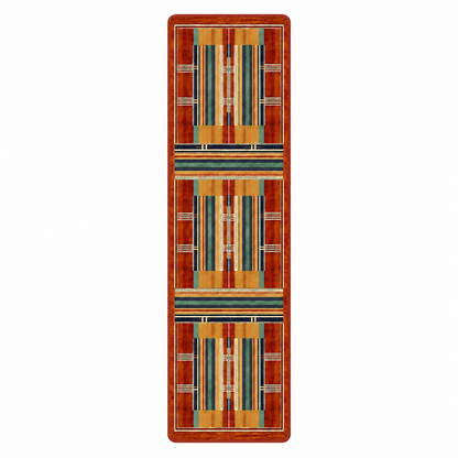 Framework area rug: a tall, narrow area rug with a geometric pattern featuring vertical stripes in rust red, orange, teal, mustard yellow, and cream, set against a solid white background.