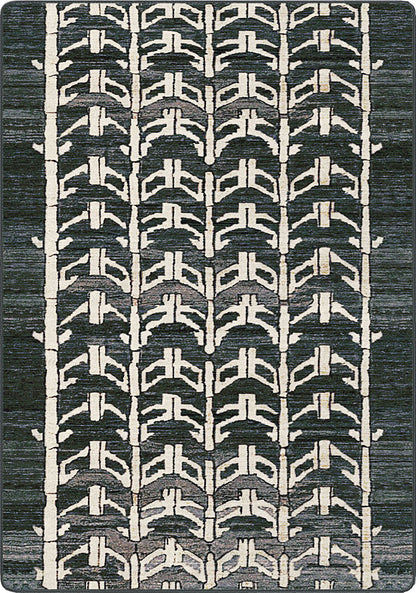 A square area rug featuring a vertical geometric pattern of repeating arches and chevrons in off-white and charcoal gray.
