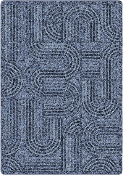 A rectangular area rug with a textured, woven geometric pattern featuring interlocking arches and parallel lines in shades of slate blue and gray.