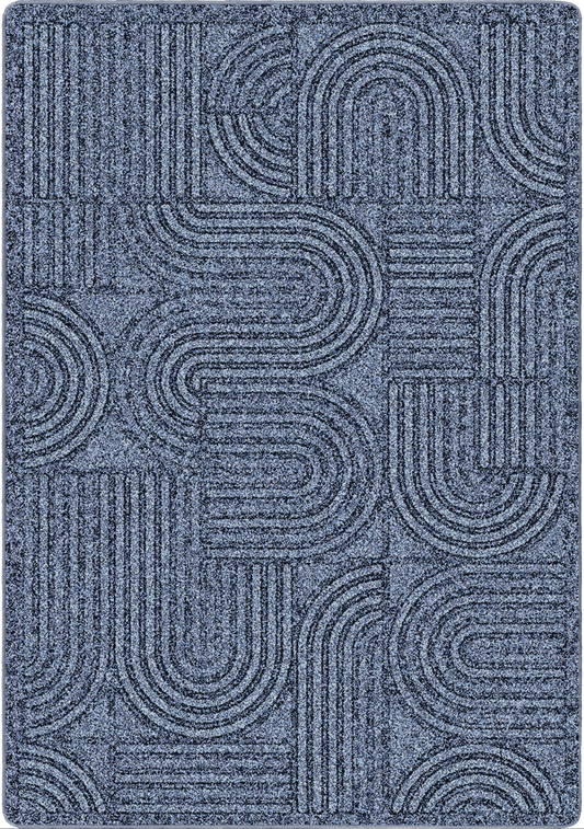 A rectangular area rug with a textured, woven geometric pattern featuring interlocking arches and parallel lines in shades of slate blue and gray.