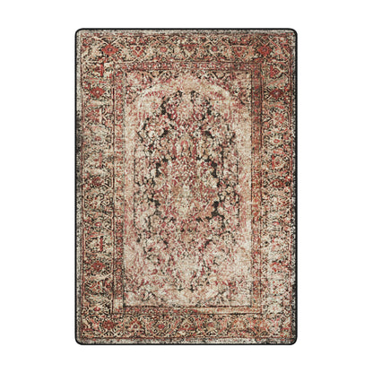 A rectangular vintage-style area rug with an ornate distressed pattern in muted red, beige, brown, and black tones, shown flat against a plain white background.