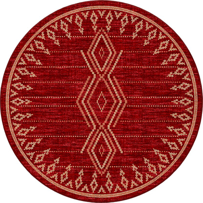 Round red rug with geometric pattern on a white background