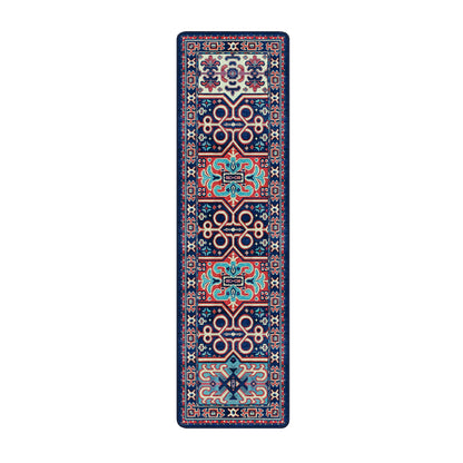 A long, narrow rectangular rug with a traditional geometric pattern in navy blue, red, turquoise, and cream, shown flat against a solid white background.