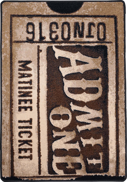 A novelty rug shaped like a vintage movie matinee ticket, featuring a textured design in beige and dark brown with stylized text reading 'ADMIT 8:30' and 'MATINEE TICKET'.