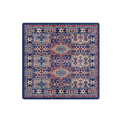 A square area rug with an intricate traditional pattern in navy blue, red, beige, and light blue, shown flat against a solid white background.